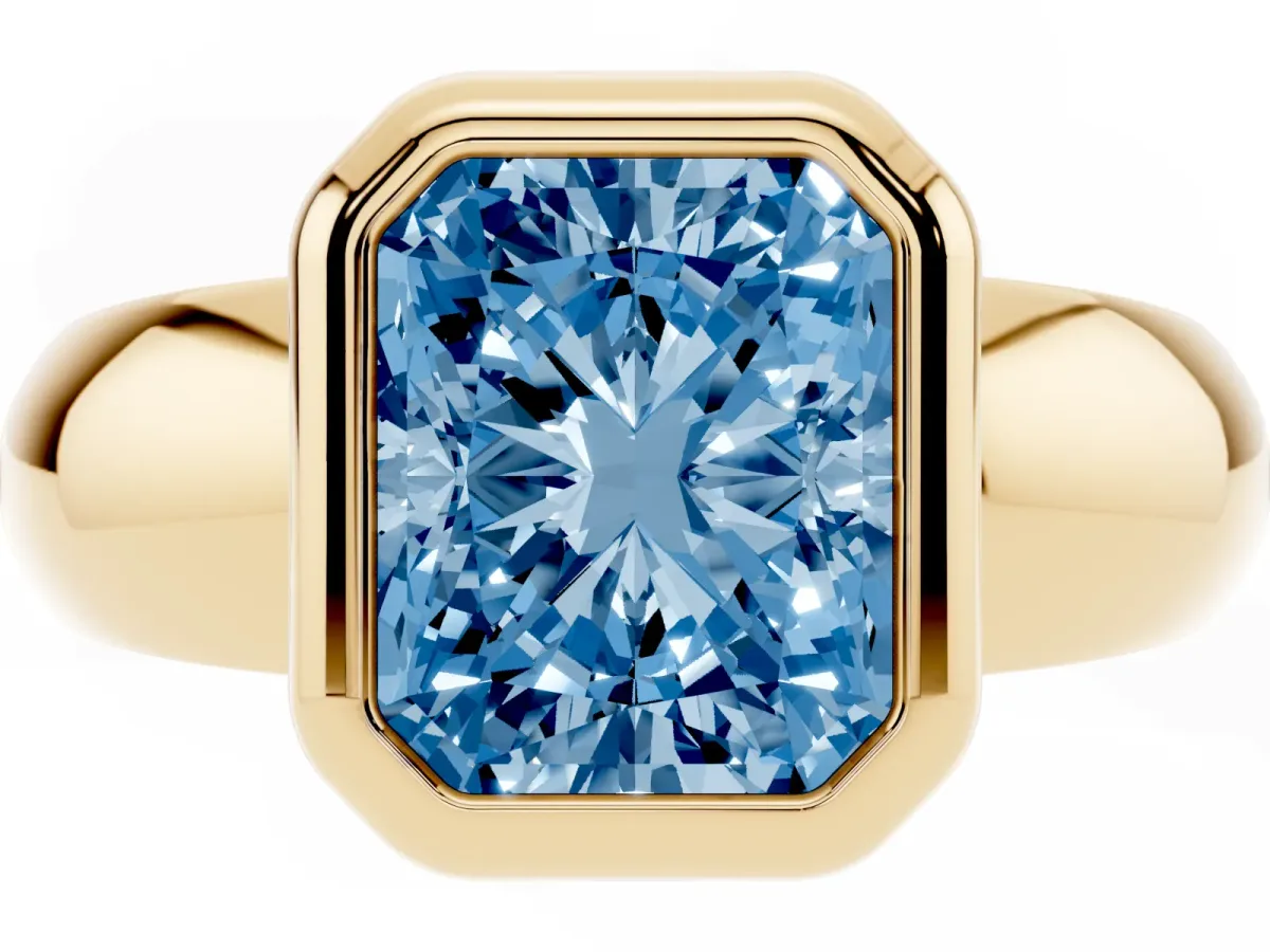 Fancy Blue Bezel Set Radiant Cut Solitaire Ring with Wide Band Yellow gold