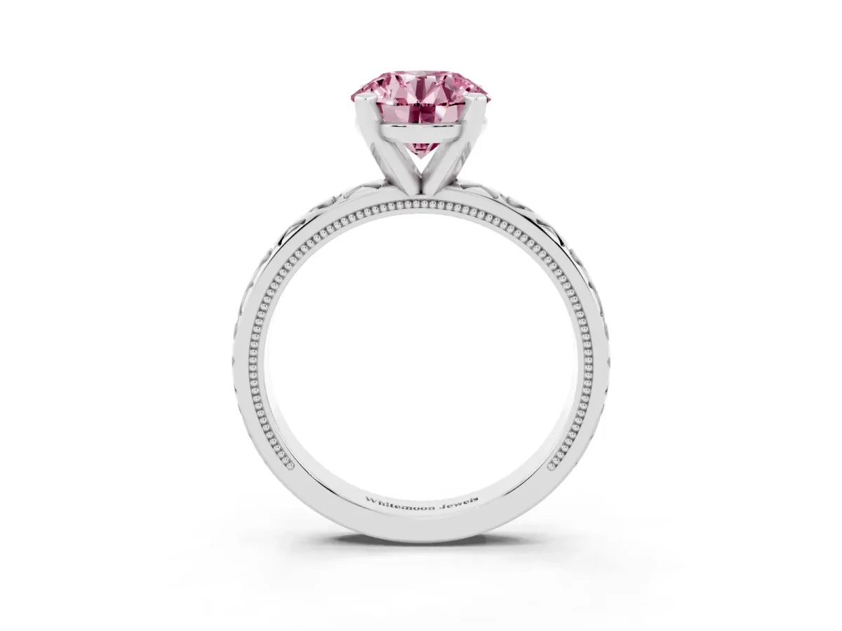 Fancy Pink Round Cut Solitaire Diamond Engagement Ring with XO Engraved Band and Four-Prong Setting Silver