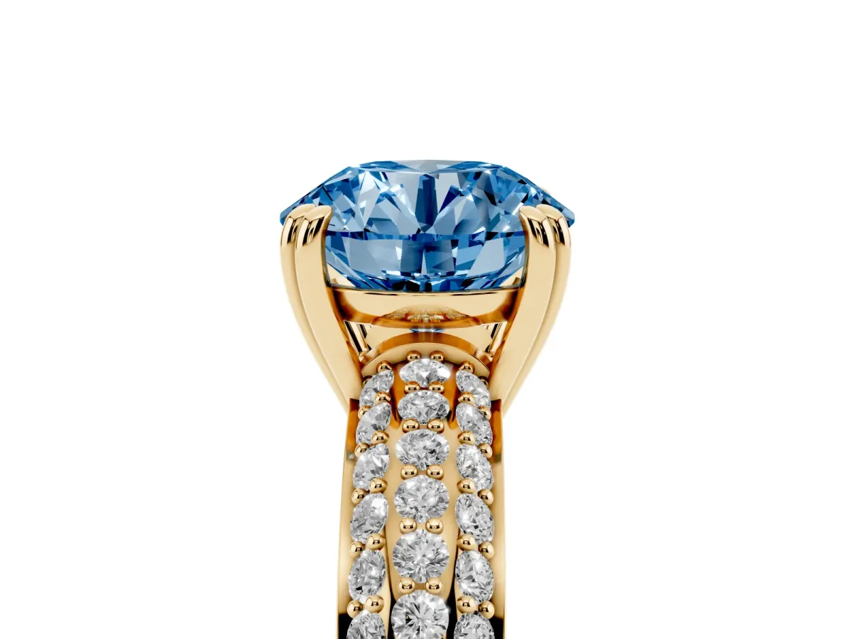 Fancy Blue Round Cut Diamond Solitaire Ring with Multi-Row Round Pavé Band and Prong Setting Yellow gold