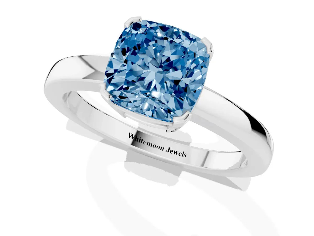 Fancy Blue Cushion Cut Cut Solitaire Ring with Four-Prong Setting and Classic Band Platinum