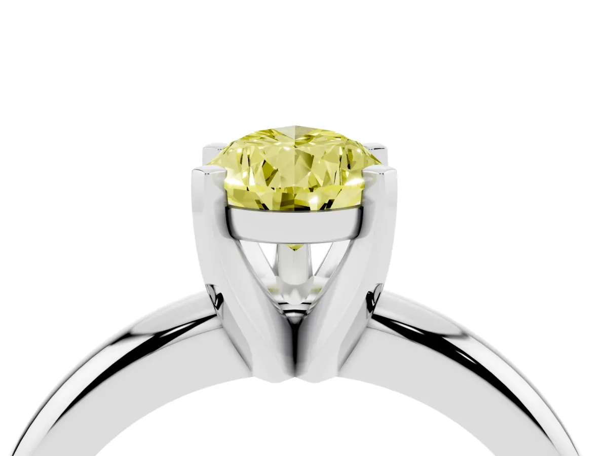 Fancy Yellow Pear Cut Diamond Solitaire Engagement Ring with Round Band and Four-Prong Setting Platinum