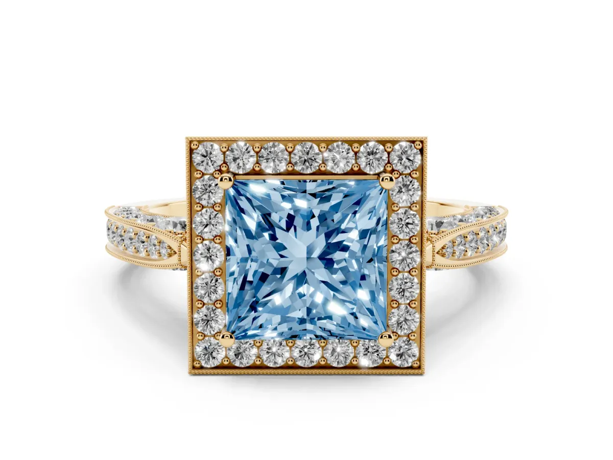 Fancy Blue Princess Cut Halo Diamond Engagement Ring with Split Shank Band and Four-Prong Setting Yellow gold