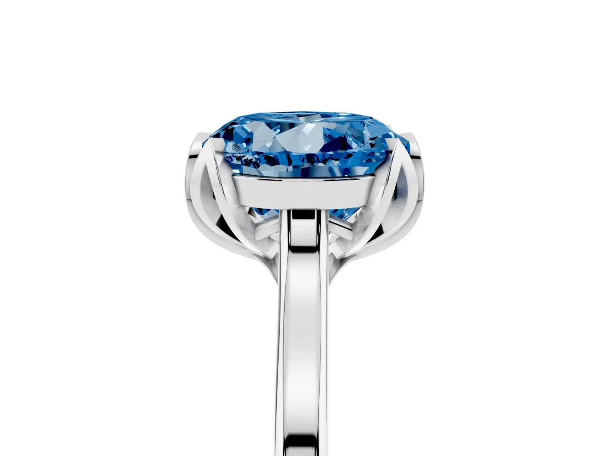 Fancy Blue Round Cut Diamond Solitaire Ring with Flower Prong Setting and Classic Band Silver