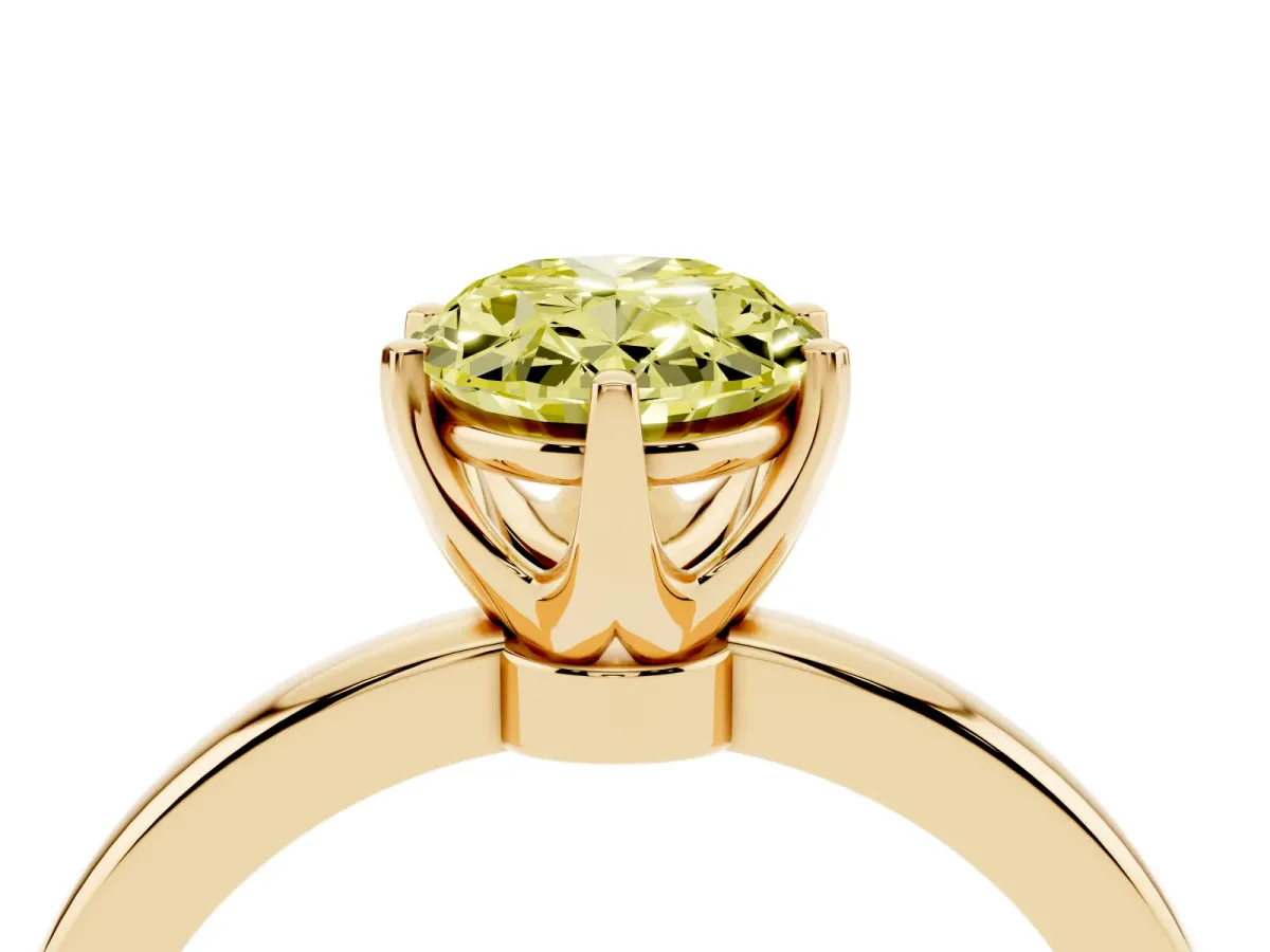 Fancy Yellow Oval Cut Solitaire Diamond Ring with Six-Prong Setting on a Classic Band Yellow gold