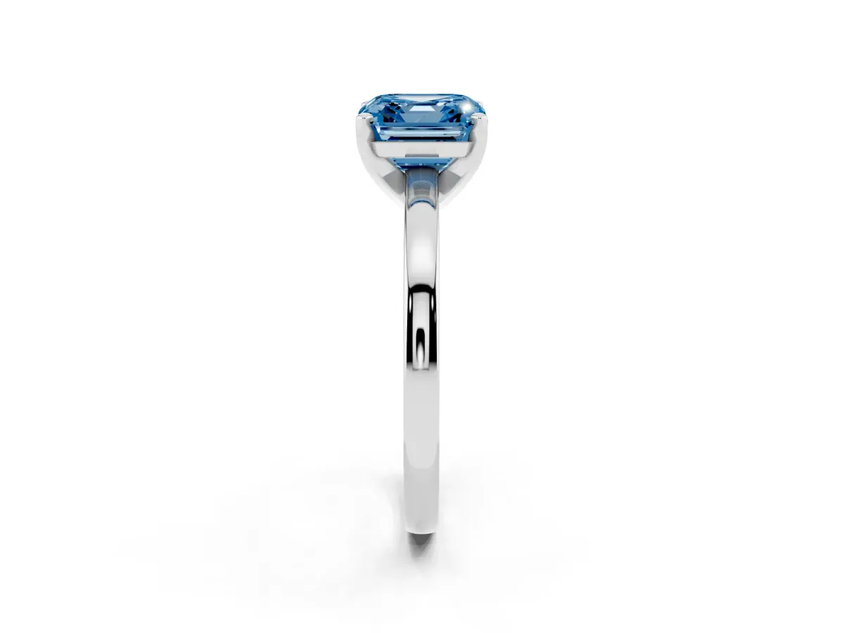 Fancy Blue Asscher Cut Solitaire Diamond Engagement Ring with Four-Prong Setting on a Classic Band Silver