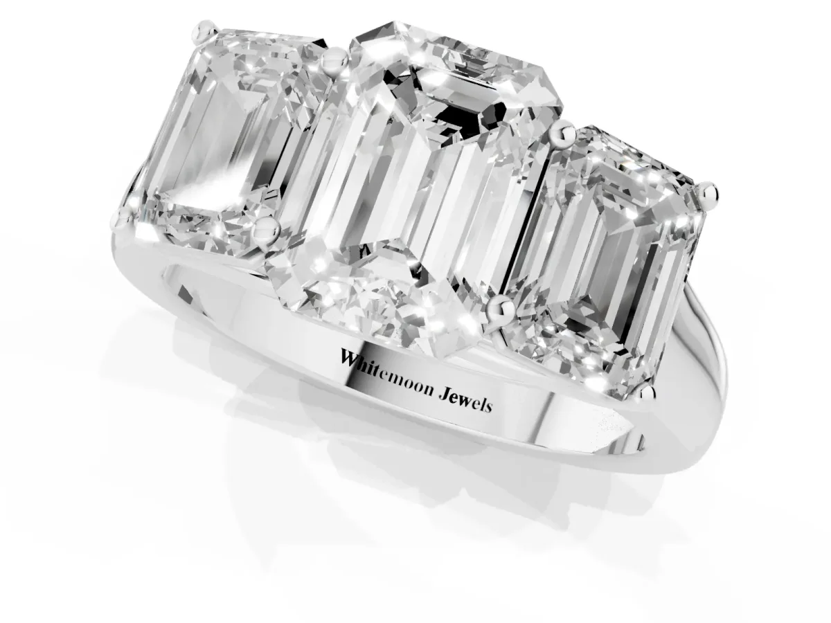 Emerald Cut Three-Stone Diamond Ring with Prong Setting on a Classic Band White gold