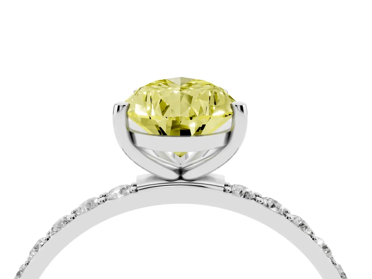 Fancy Yellow Pear Cut Diamond Solitaire Ring with Round Pavé Shoulders and Prong Setting Platinum