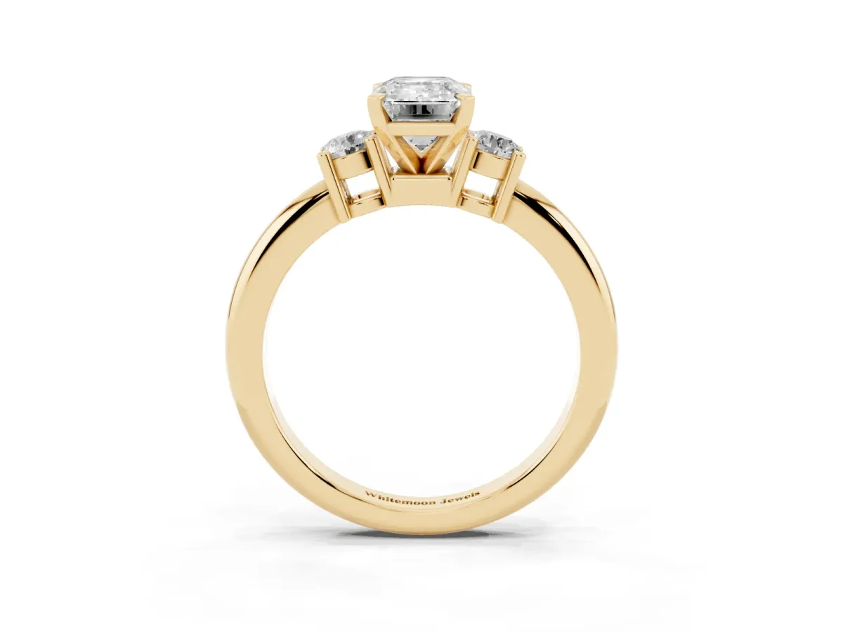Three-Stone Emerald Cut Cut Diamond Solitaire with Prong Setting and Classic Band Yellow gold