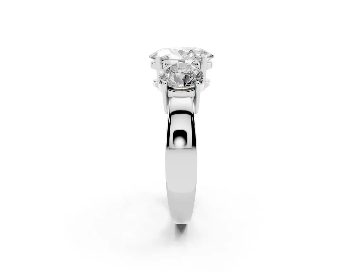 Three-Stone Oval Cut Diamond Ring with Round Side Stones, Classic Band, and Four-Prong Setting Silver