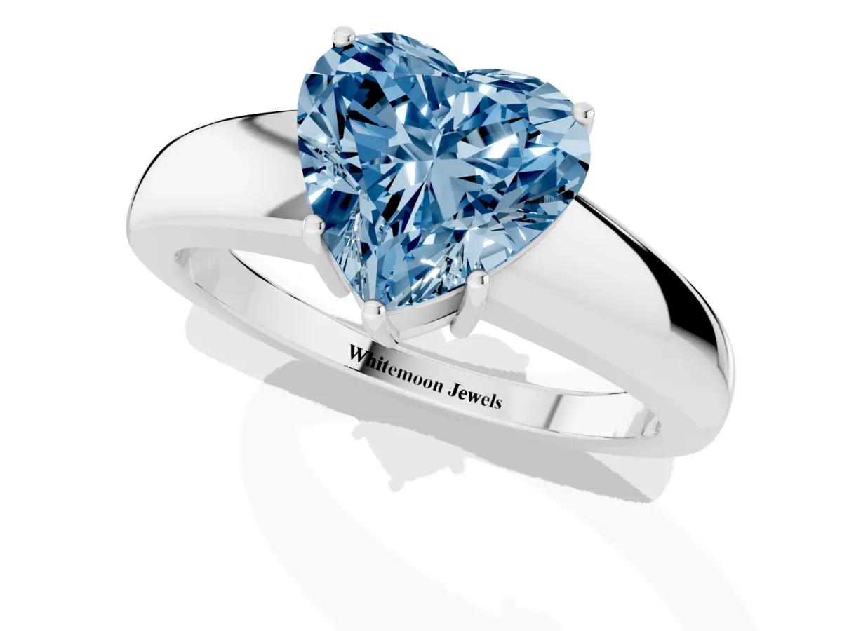 Fancy Blue Heart Cut Solitaire Diamond Ring with Tapered Band and Four-Prong Setting White gold