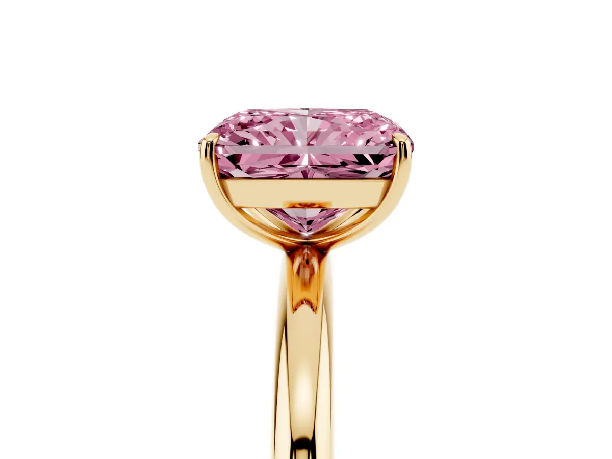 Fancy Pink Radiant Cut Solitaire Diamond Ring with Four-Prong Setting on a Plain Band Yellow gold