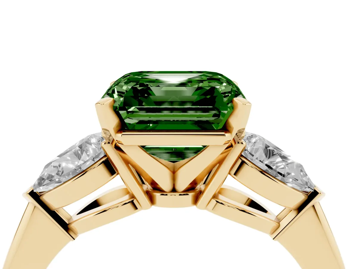 Fancy Green Three-Stone Asscher Cut Diamond Ring with Pear Side Stones and Four-Prong Setting Yellow gold