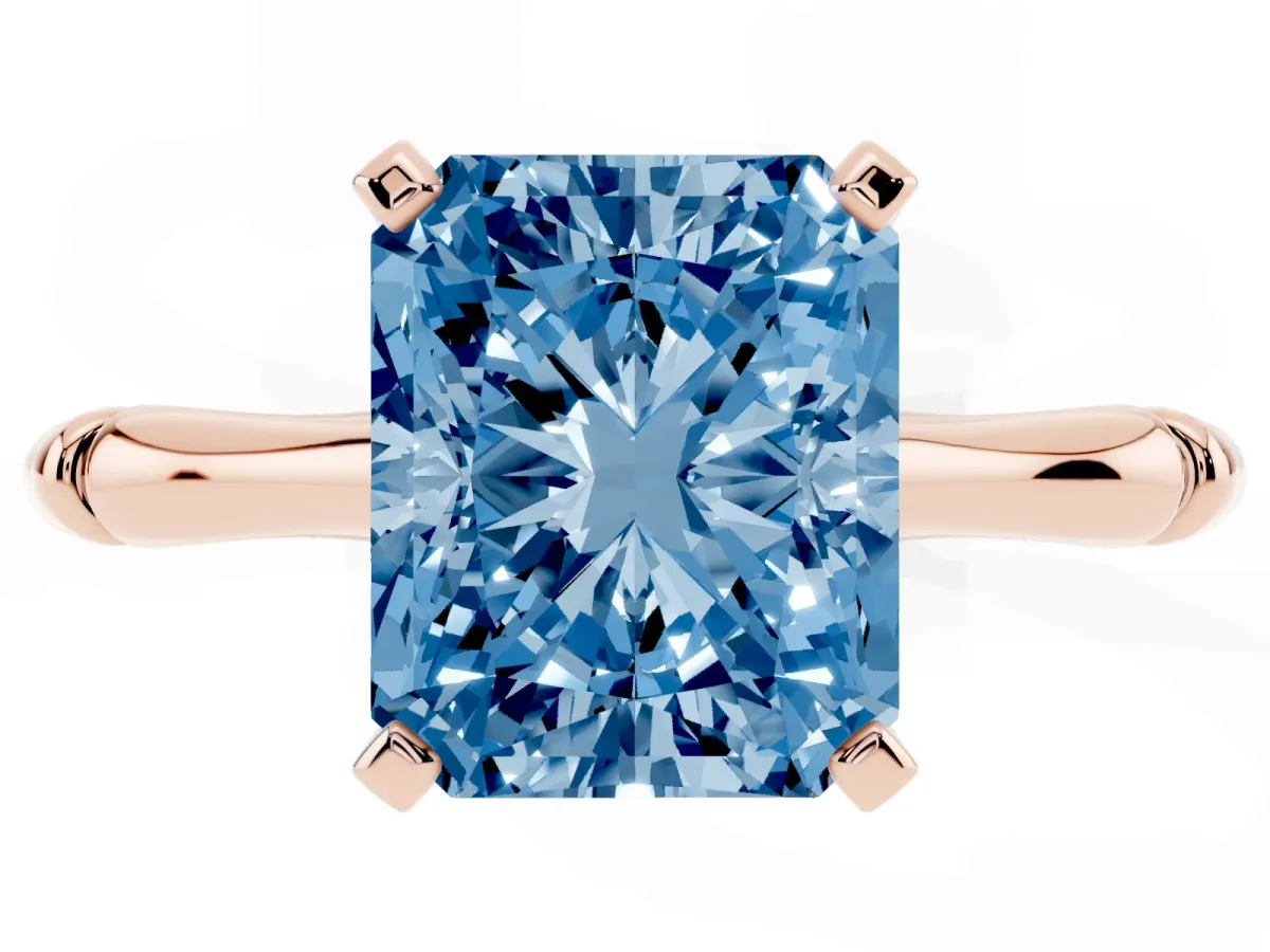 Fancy Blue Radiant Cut Solitaire Diamond Ring with Bamboo Band and Four-Prong Setting Rose gold