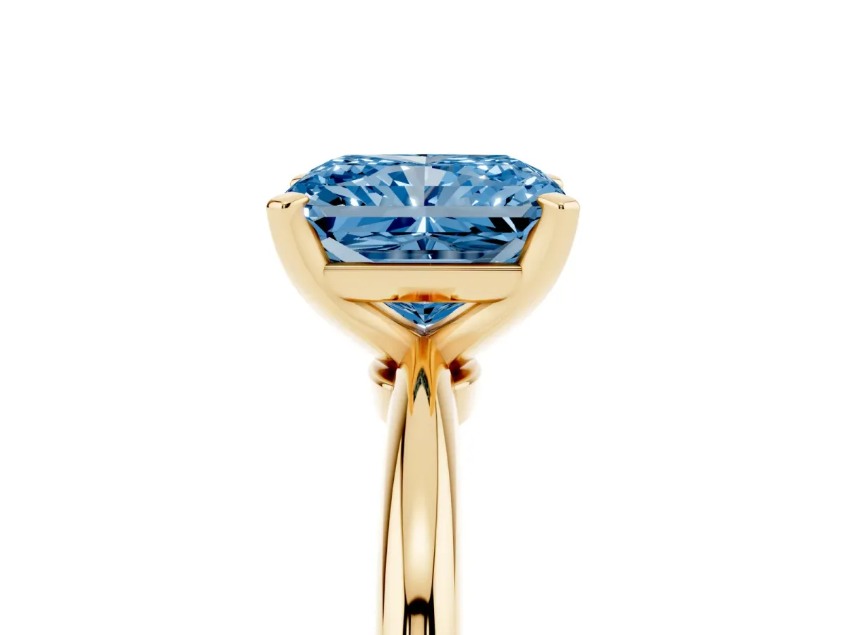 Fancy Blue Radiant Cut Diamond Solitaire Ring with Prong Setting and Classic Band Yellow gold