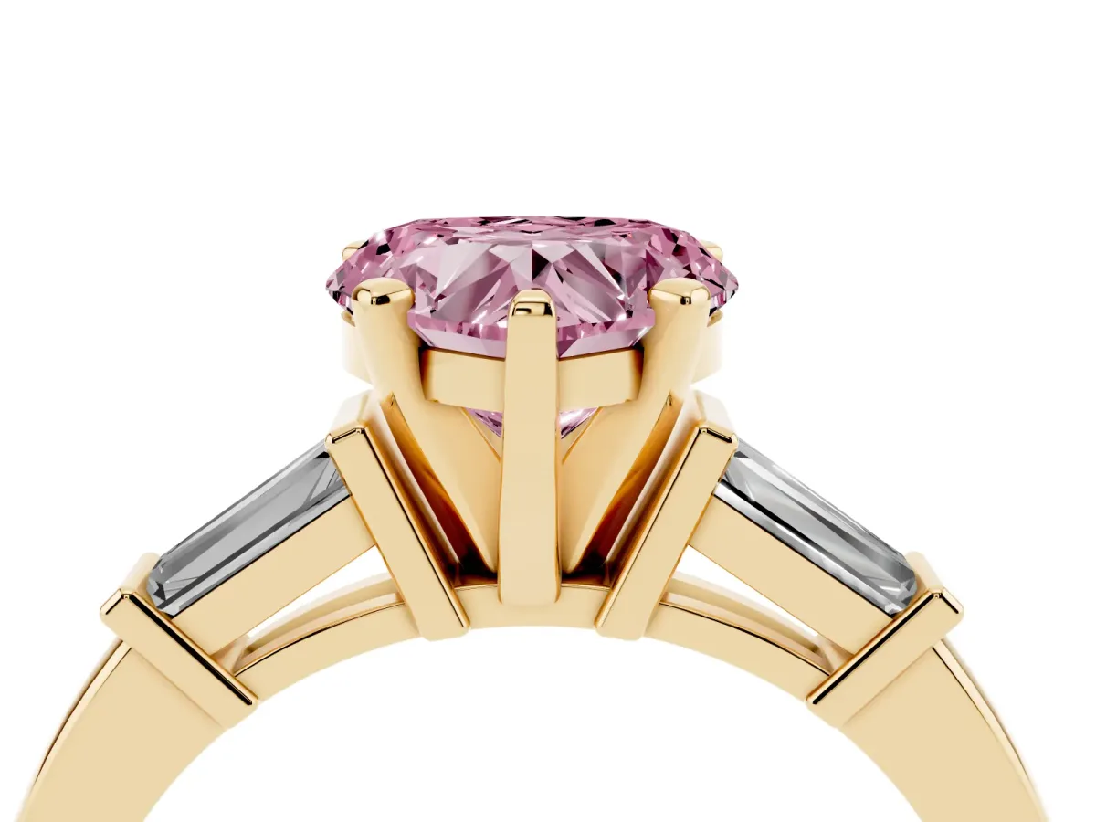Fancy Pink Heart Cut Cut Diamond Solitaire Ring with Tapered Baguette Accents and Four-Prong Setting Yellow gold