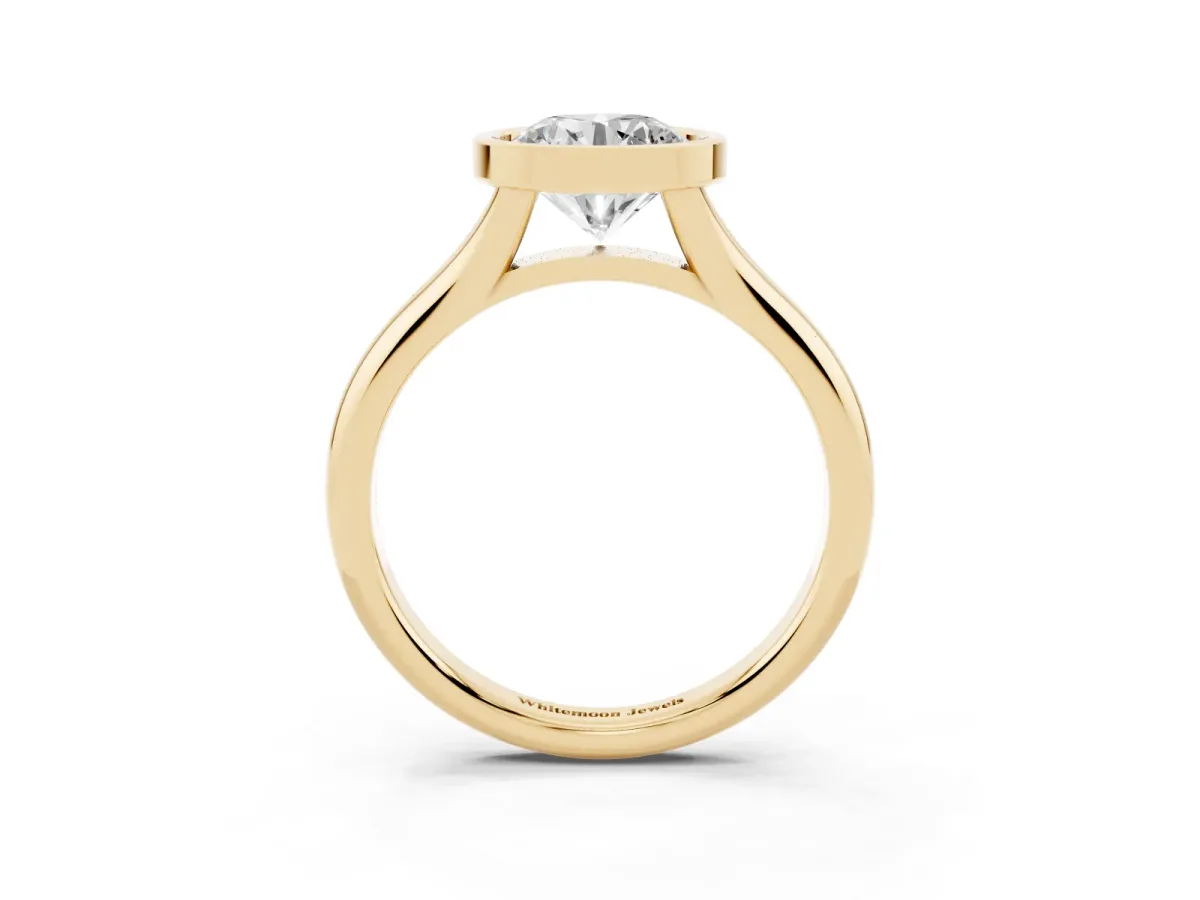 Bezel Set Round Cut Solitaire Diamond Ring with Smooth Band Yellow gold