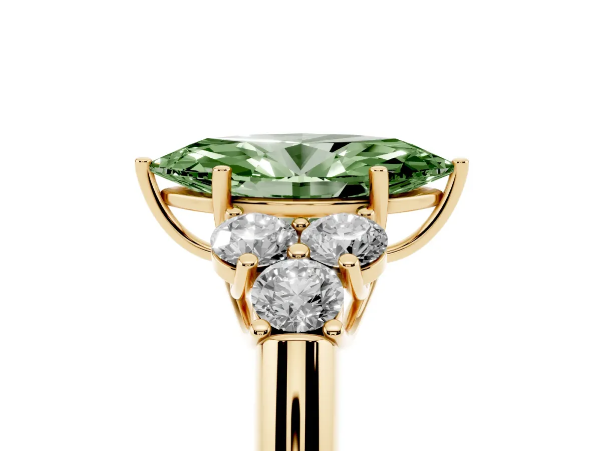 Fancy Green Marquise Cut Cut Diamond Cluster Ring with Round Accent Stones and Prong Setting on a Classic Band Yellow gold