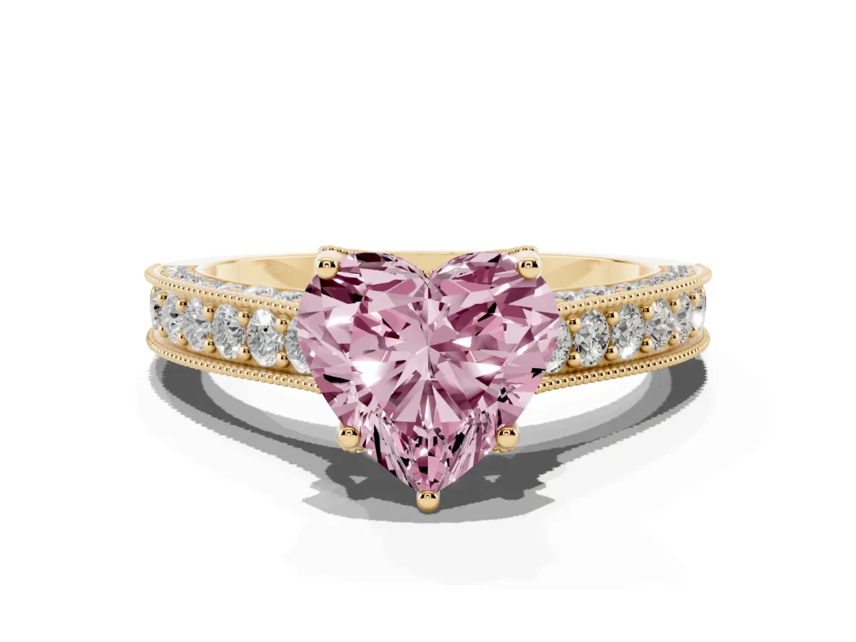 Fancy Pink Heart Cut Cut Diamond Solitaire Ring with Milgrain Pave Band and Four Prong Setting Yellow gold