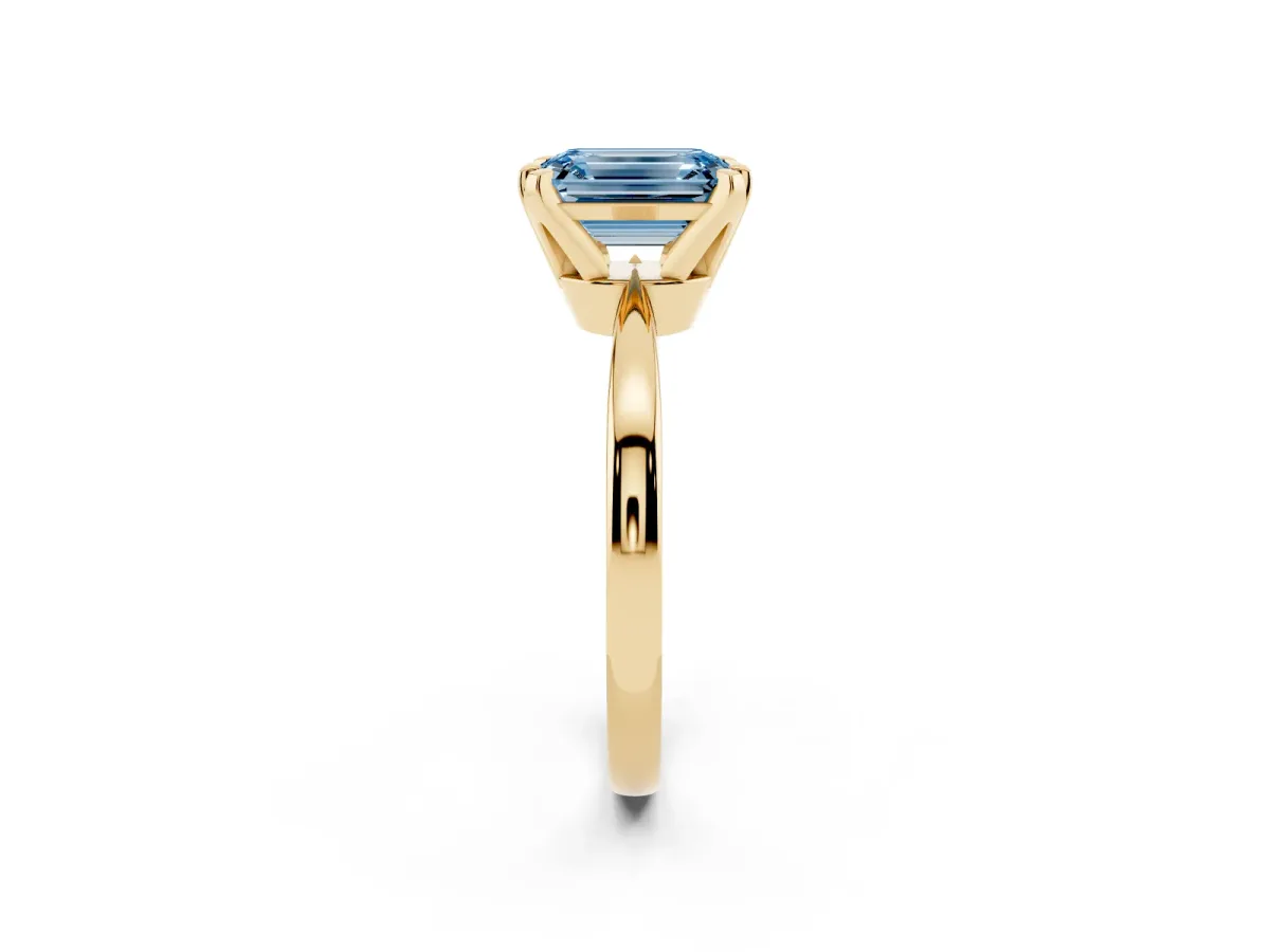 Fancy Blue Emerald Cut Solitaire Engagement Ring with Six-Prong Setting and Tapered Band Yellow gold