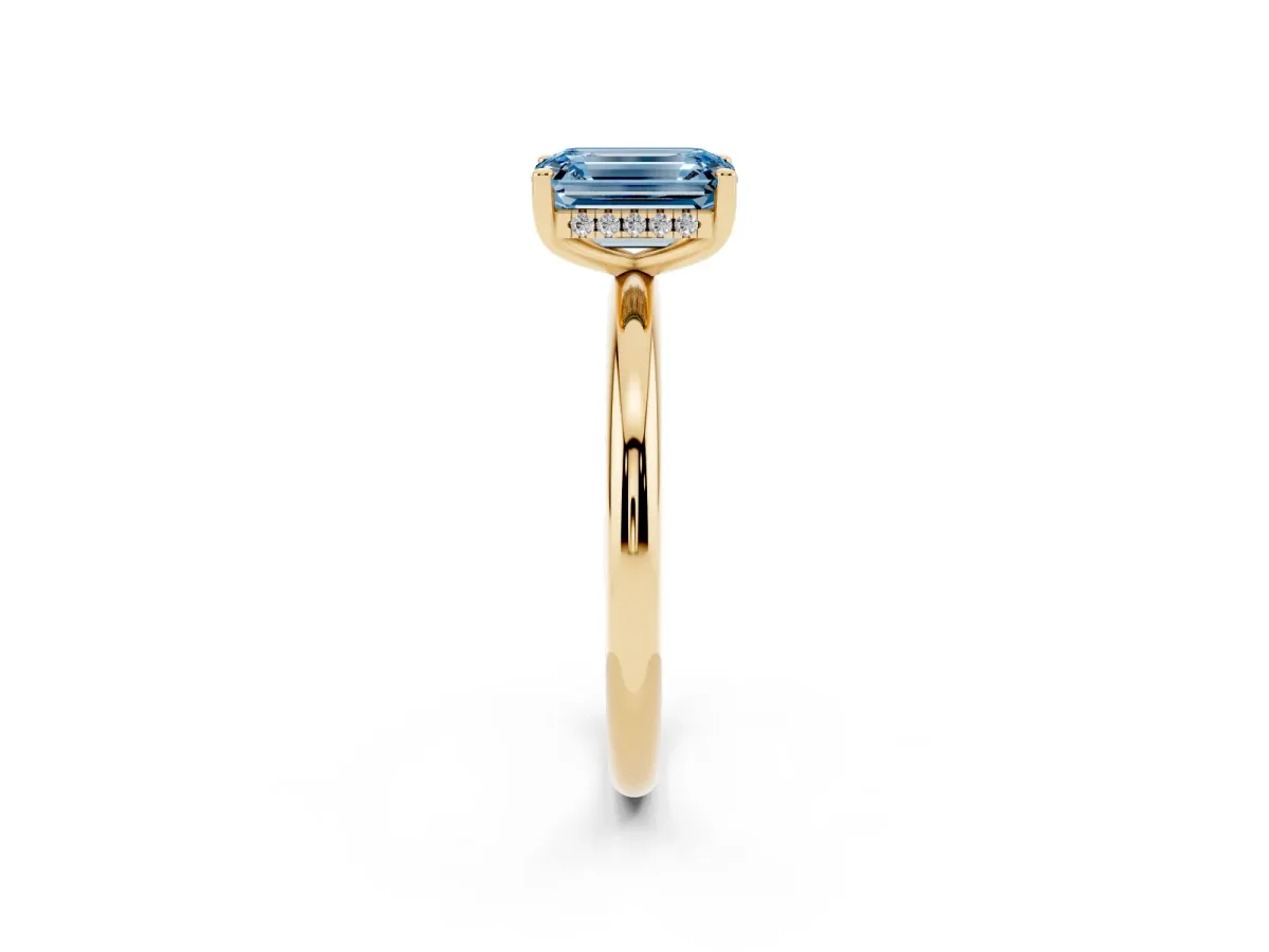 Fancy Blue Emerald Cut Cut Solitaire Engagement Ring with Four-Prong Setting and Classic Band Yellow gold