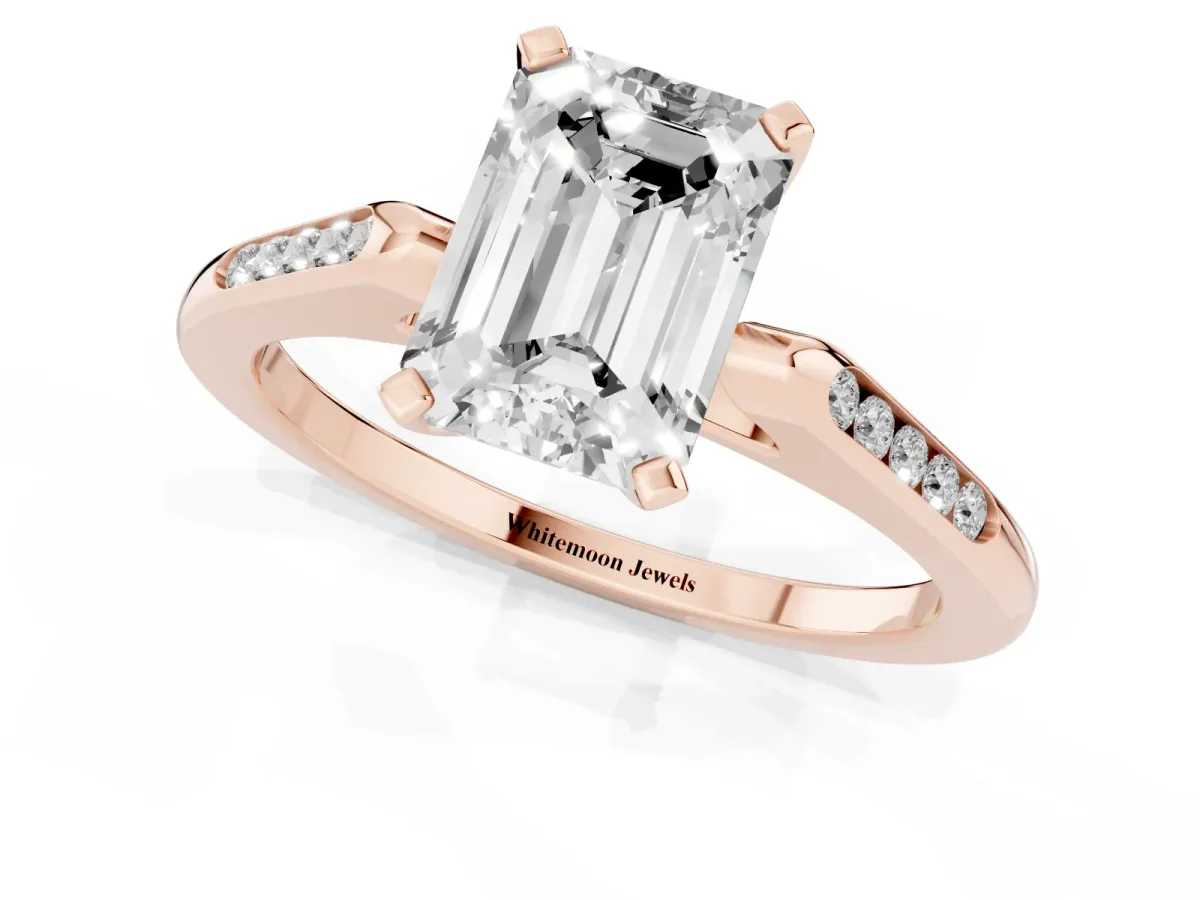 Emerald Cut Diamond Solitaire Ring with Channel Set Round Band and Prong Setting Rose gold