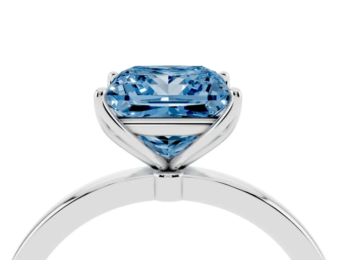 Fancy Blue Princess Cut Diamond Solitaire Ring with Thin Band and Prong Setting Platinum
