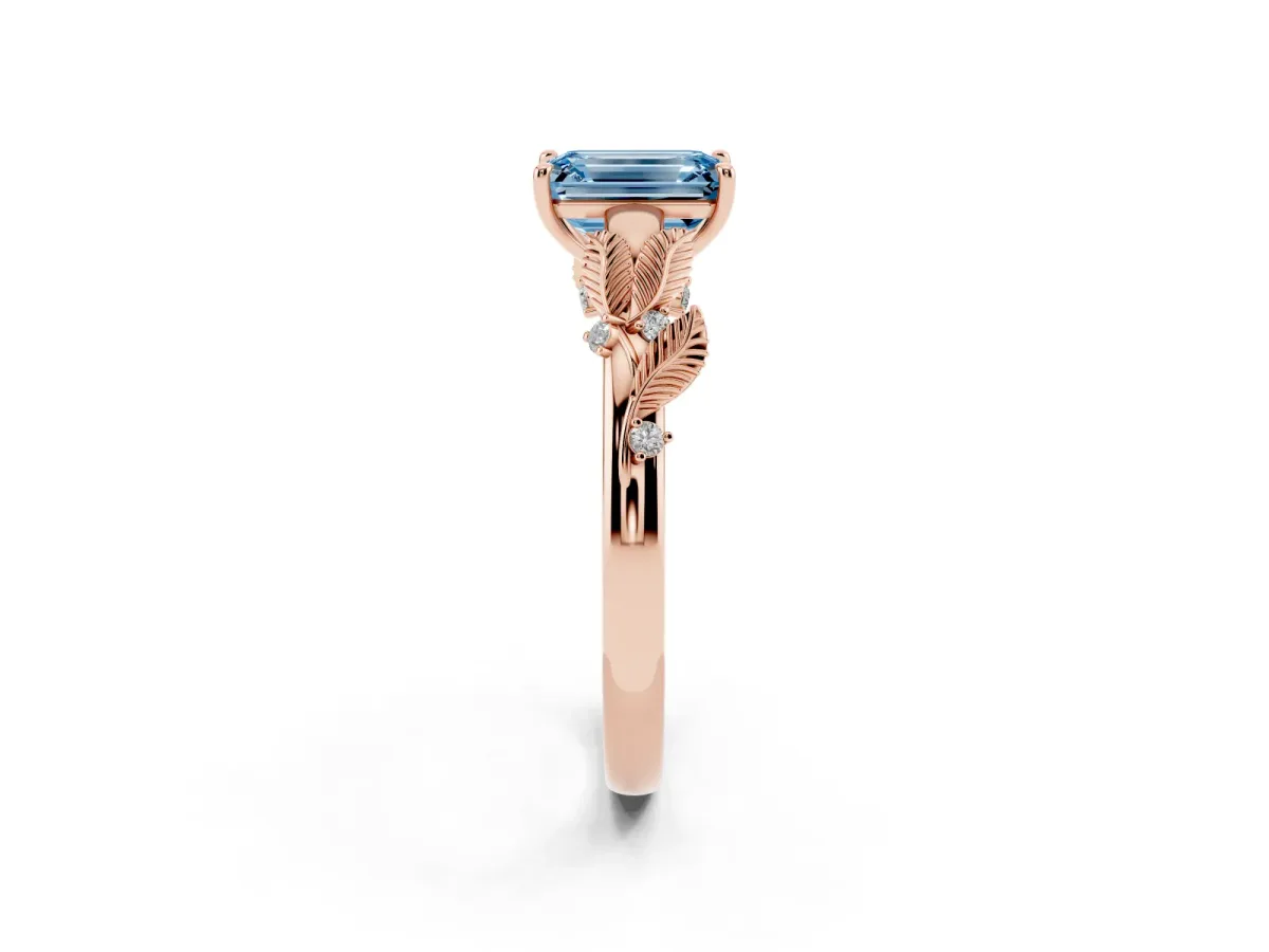 Fancy Blue Emerald Cut Diamond Solitaire Ring with Leaf Motif Band and Four-Prong Setting Rose gold