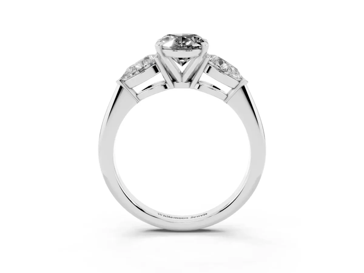 Fancy Black Three-Stone Oval Cut Diamond Ring with Pear Side Stones and Four-Prong Setting Silver