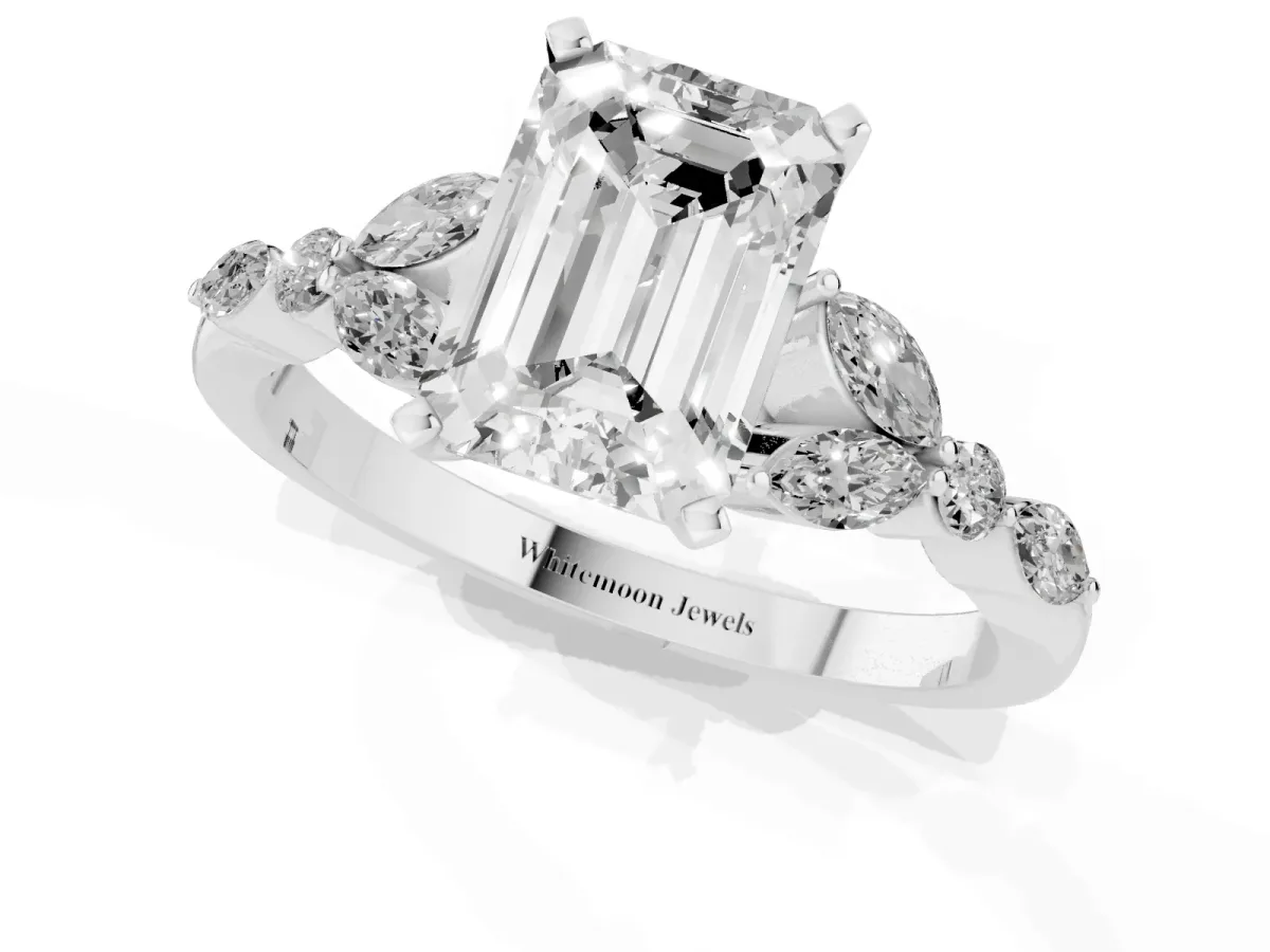 Emerald Cut Diamond Solitaire Ring with Side Stones and Four-Prong Setting Platinum