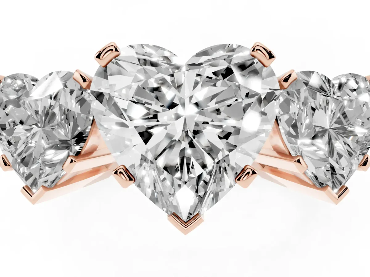 Three-Stone Heart Cut Cut Diamond Ring with Channel Set Band and Four-Prong Setting Rose gold