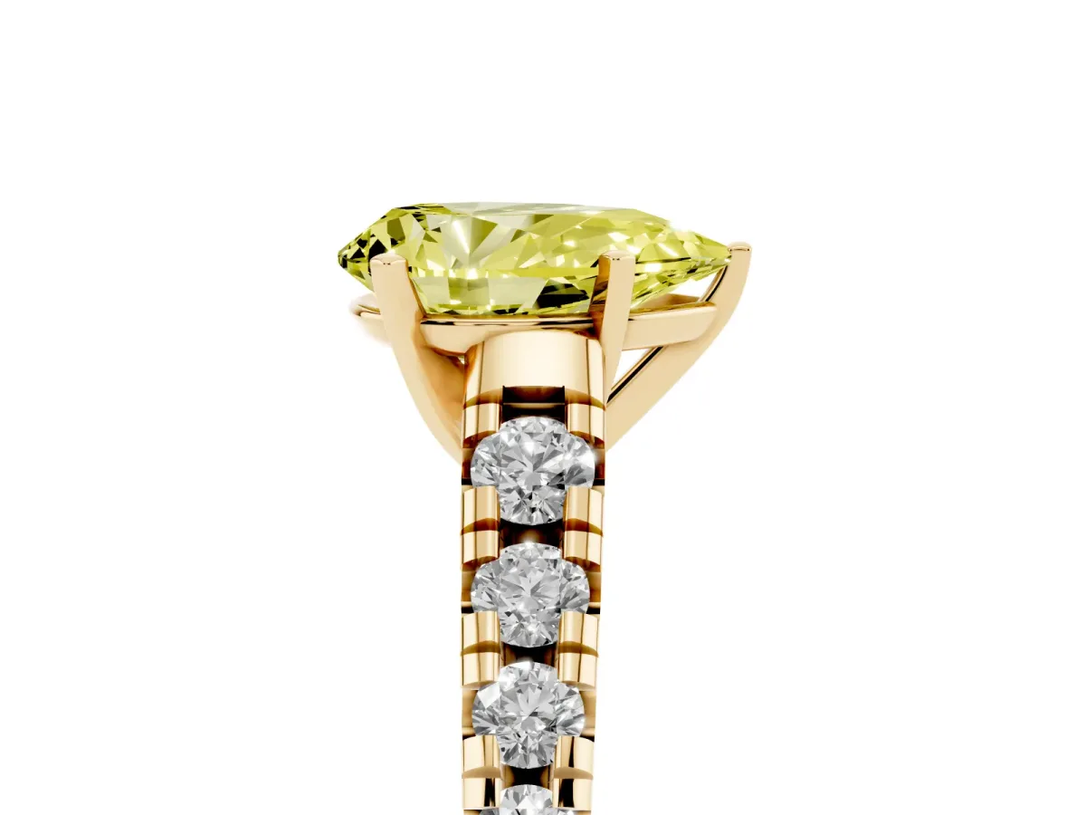 Fancy Yellow Pear Cut Diamond Cathedral Solitaire Ring with Round Pavé Band Yellow gold