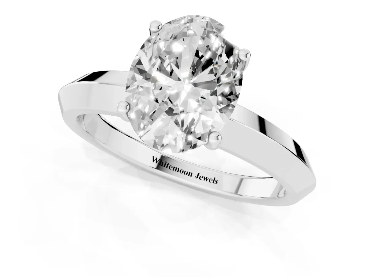 Oval Cut Cut Solitaire Engagement Ring with Flat Band and Four-Prong Setting Platinum