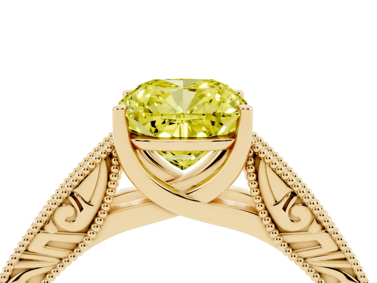 Fancy Yellow Cushion Cut Diamond Solitaire Ring with Engraved Band and Four-Prong Setting Yellow gold