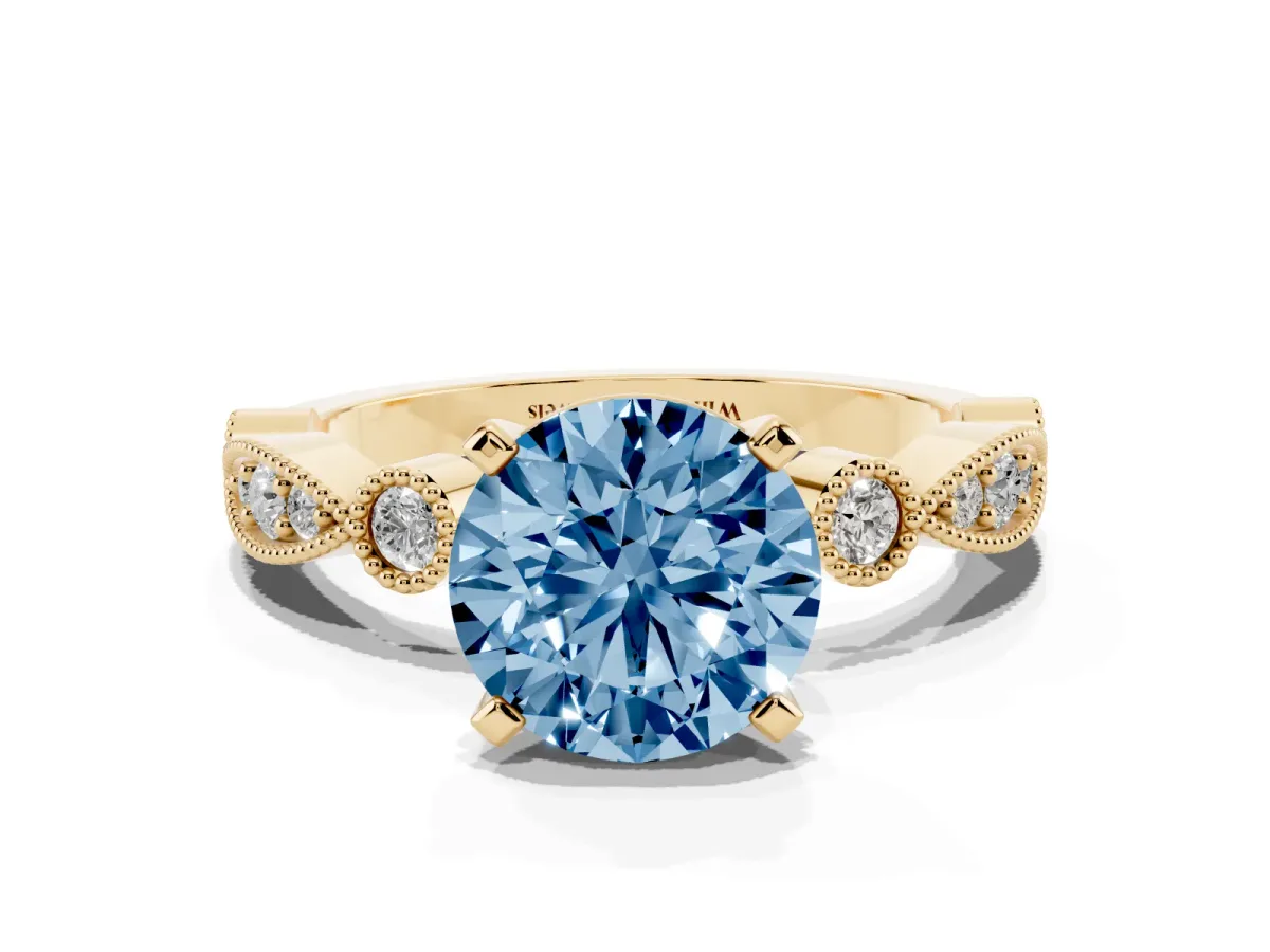 Fancy Blue Round Cut Milgrain Bezel Diamond Engagement Ring with Solitaire Prong Setting Yellow gold