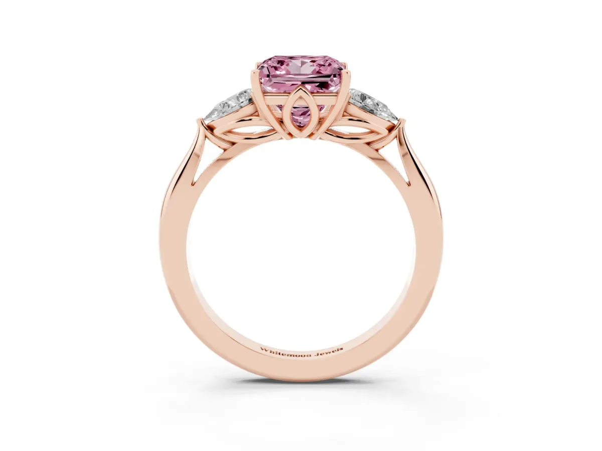 Fancy Pink Three-Stone Princess Cut Diamond Ring with Pear Side Stones in Four-Prong Setting Rose gold