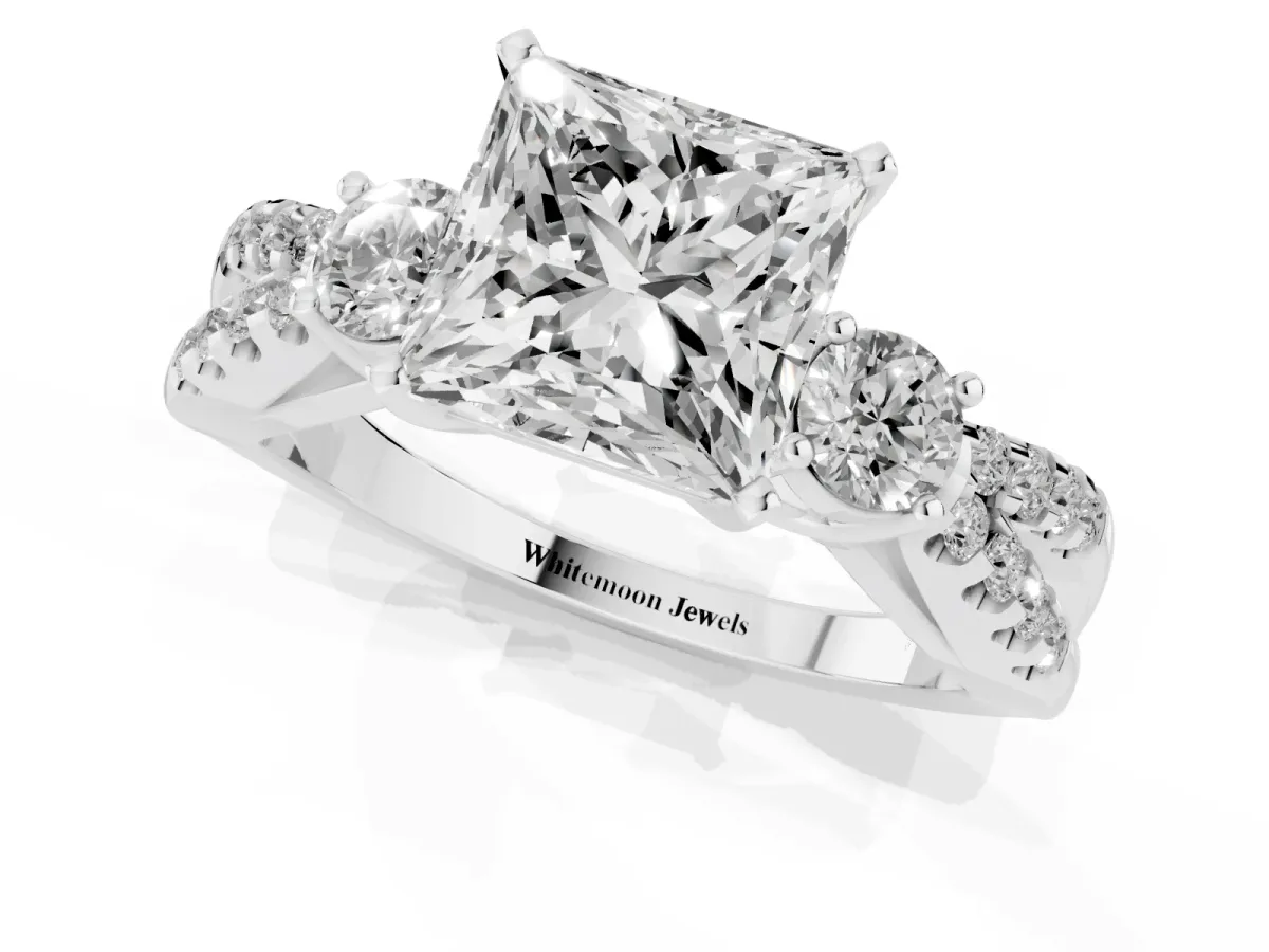Princess Cut Diamond Three-Stone Ring with Pavé Split Shank and Four-Prong Setting Silver