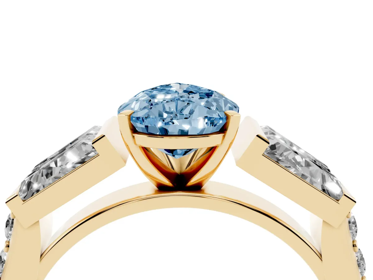 Fancy Blue Pear Cut Diamond Engagement Ring with Baguette Side Stones and Channel Set Band Yellow gold