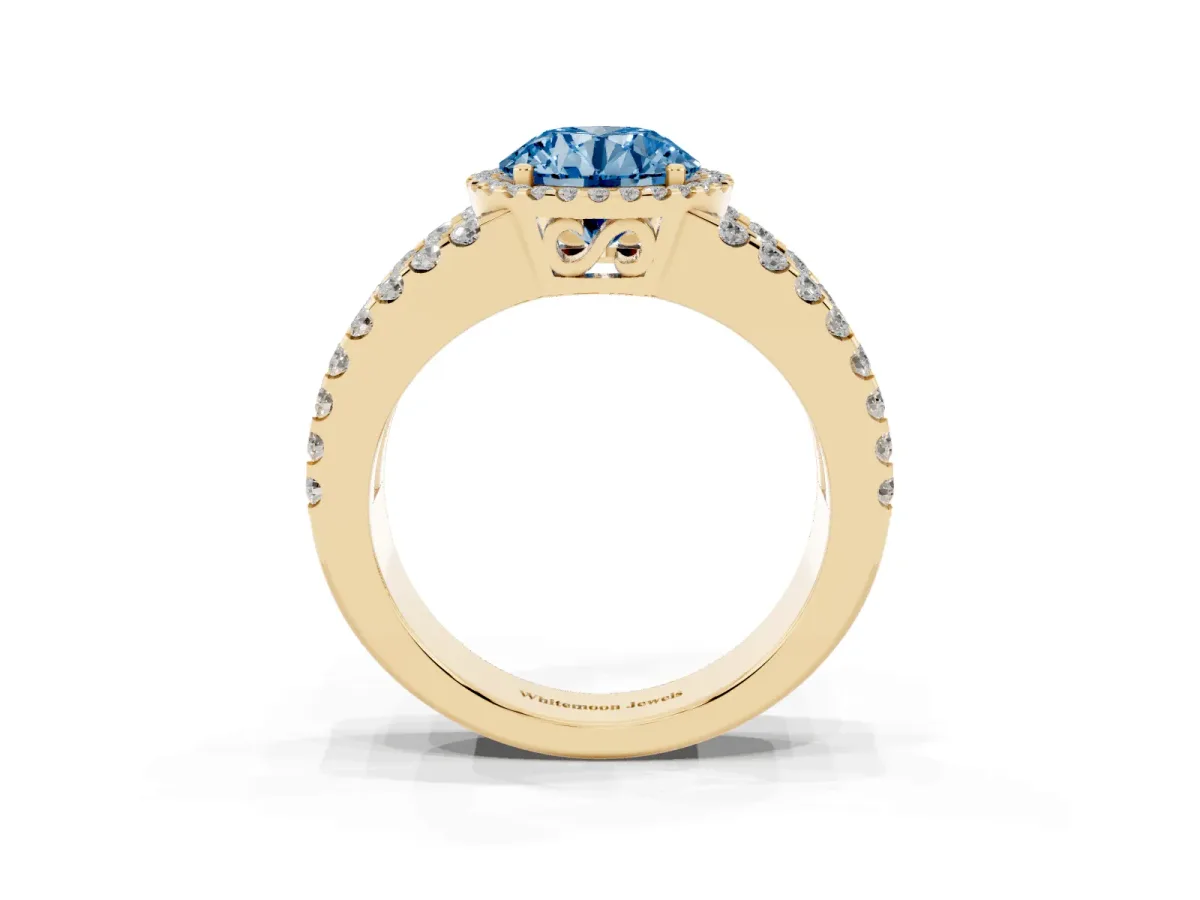 Fancy Blue Round Cut Cut Halo Split Shank Diamond Ring with Four-Prong Setting Yellow gold