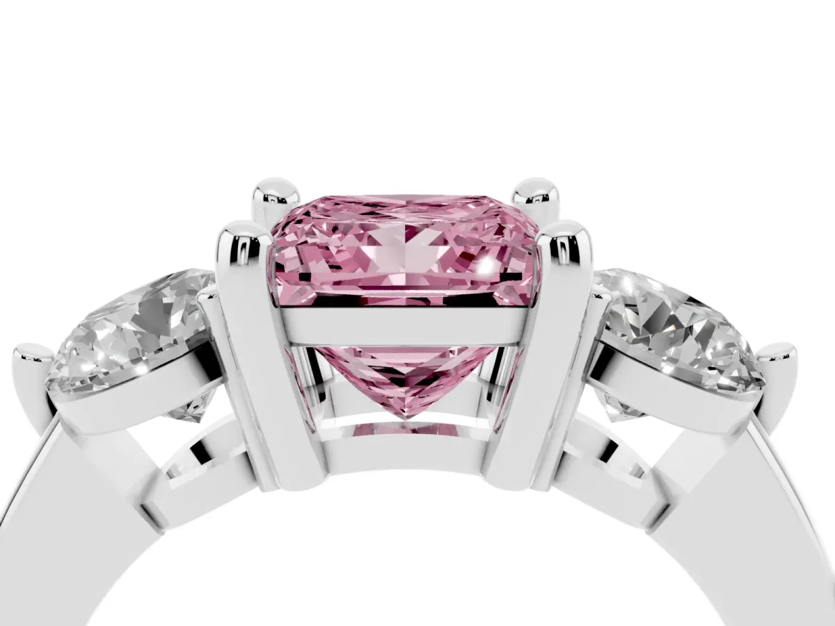 Fancy Pink Three-Stone Princess Cut Brilliant Cut Solitaire Ring with Prong Setting on a Classic Band Silver