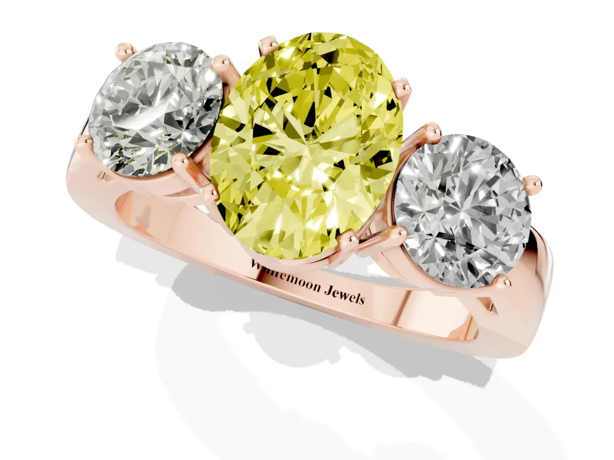 Fancy Yellow Three-Stone Oval Cut Diamond Ring with Round Side Stones, Classic Band, and Four-Prong Setting Rose gold