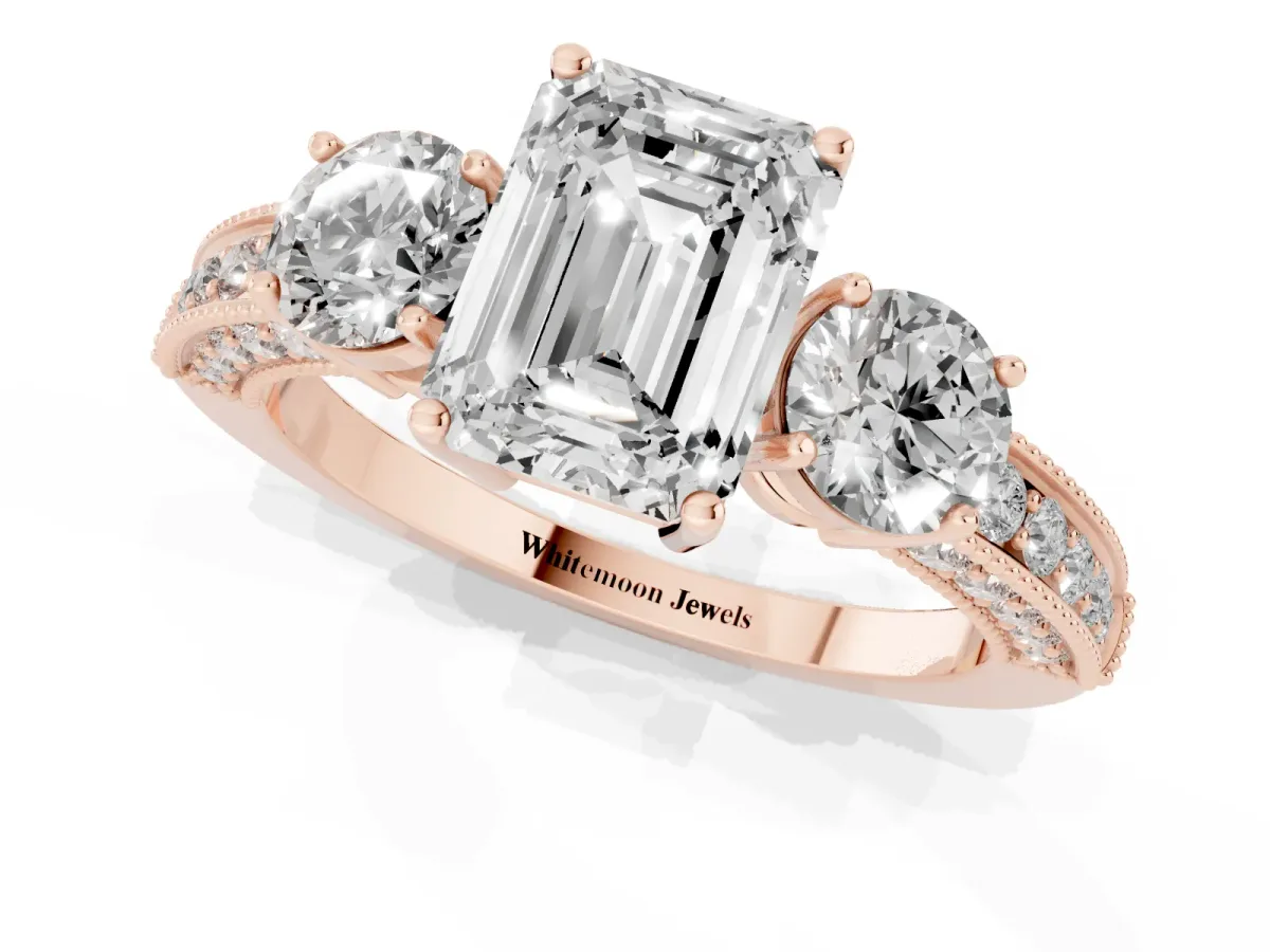 Emerald Cut Three-Stone Diamond Ring with Pavé Band and Four-Prong Setting Rose gold