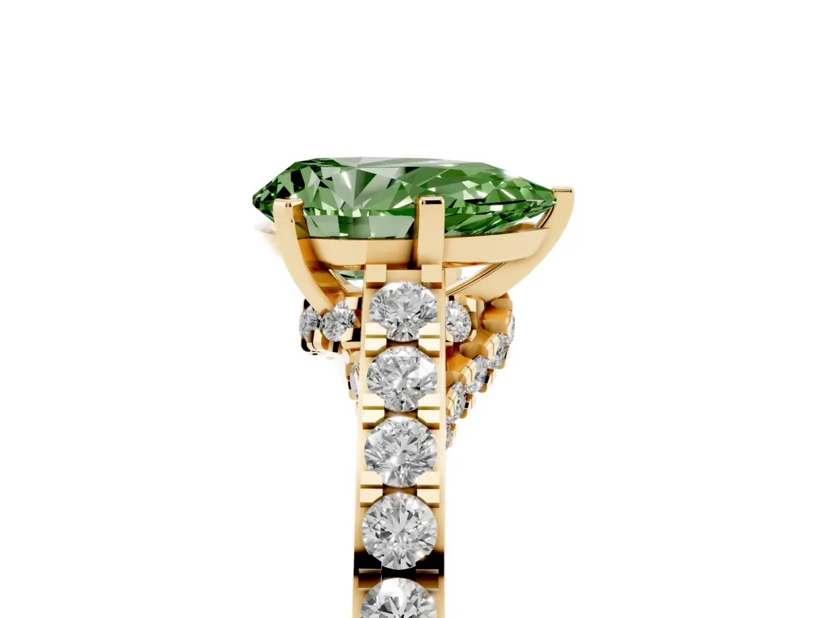 Fancy Green Pear Cut Diamond Solitaire Ring with Crossover Gallery and Round Pavé Band Yellow gold