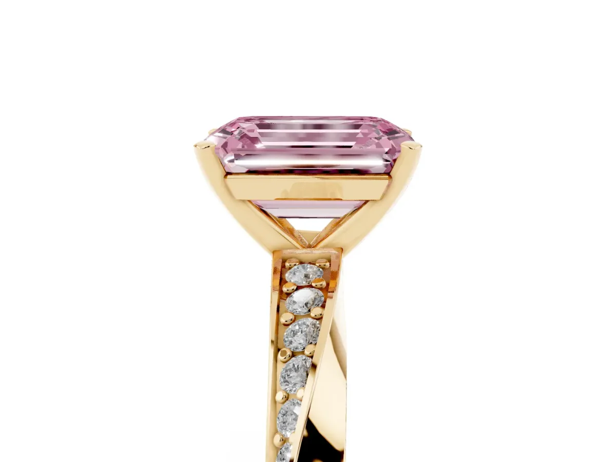 Fancy Pink Emerald Cut Diamond Engagement Ring with Side Stone Accents and Four-Prong Setting Yellow gold
