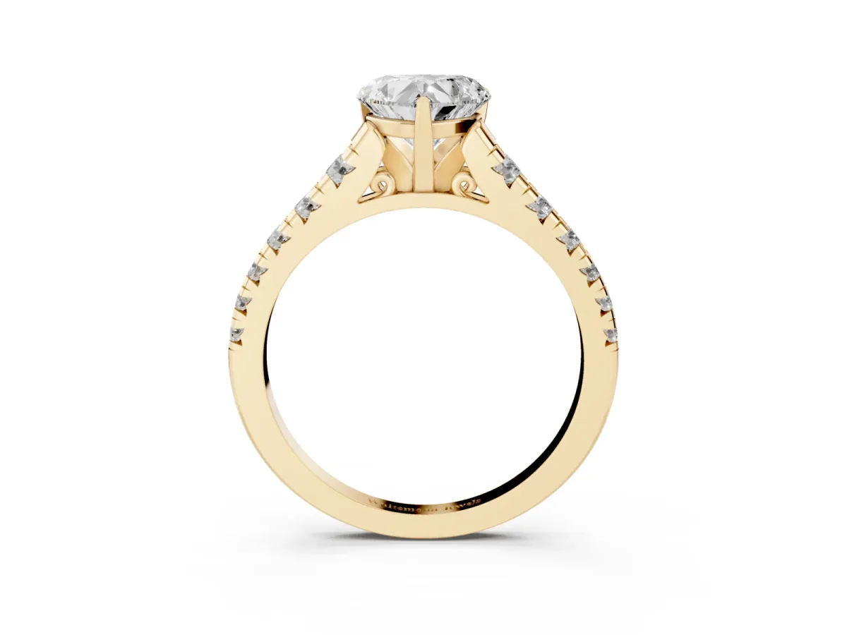 Heart Cut Diamond Cathedral Solitaire Ring with Round Pavé Band Yellow gold