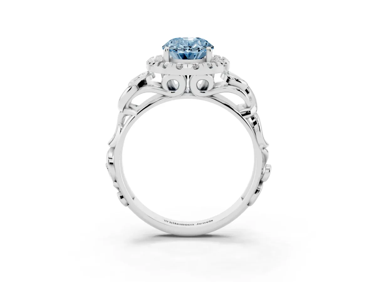 Fancy Blue Oval Cut Cut Halo Diamond Ring with Scrollwork Band and Four-Prong Setting Silver