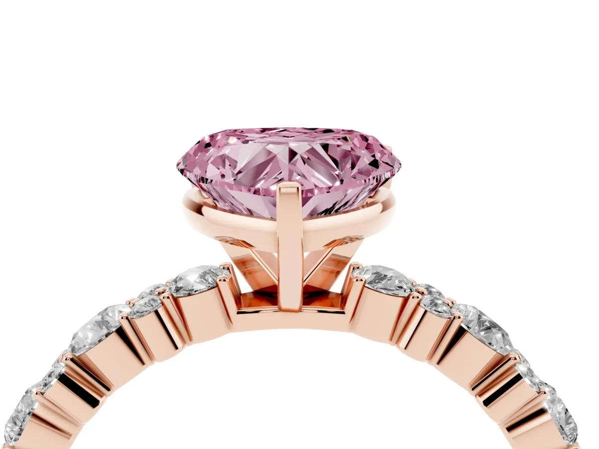 Fancy Pink Heart Cut Diamond Side Stone Solitaire Ring with Round and Four-Prong Setting Rose gold