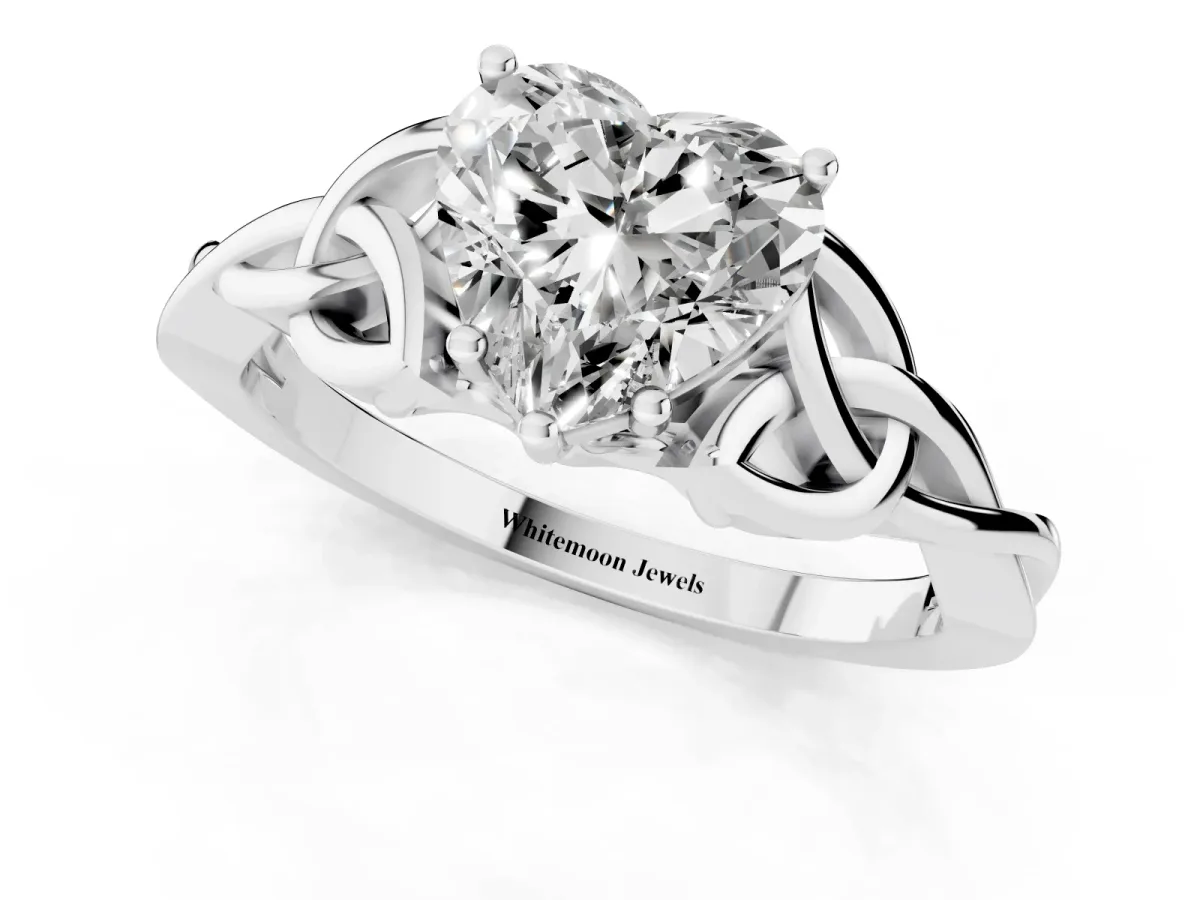 Heart Cut Diamond Solitaire Engagement Ring with Celtic Knot Band and Four-Prong Setting Platinum