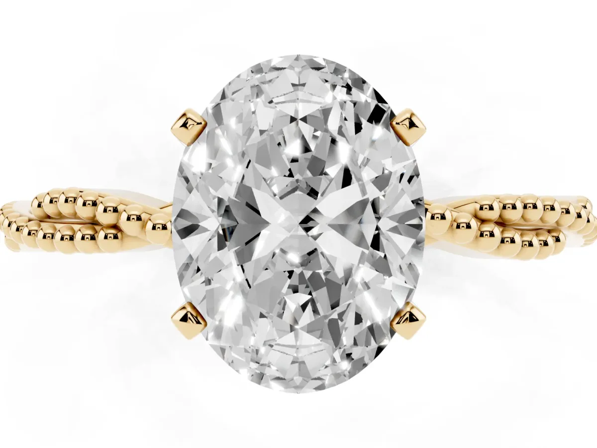 Oval Cut Solitaire Twisted Band with Bead Prong Setting Yellow gold