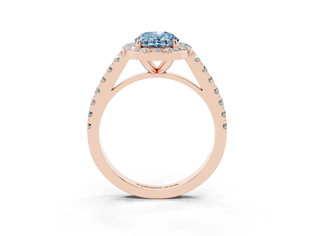 Fancy Blue Oval Cut Diamond Halo Ring with Round Pavé Split Shank and Prong Setting Rose gold