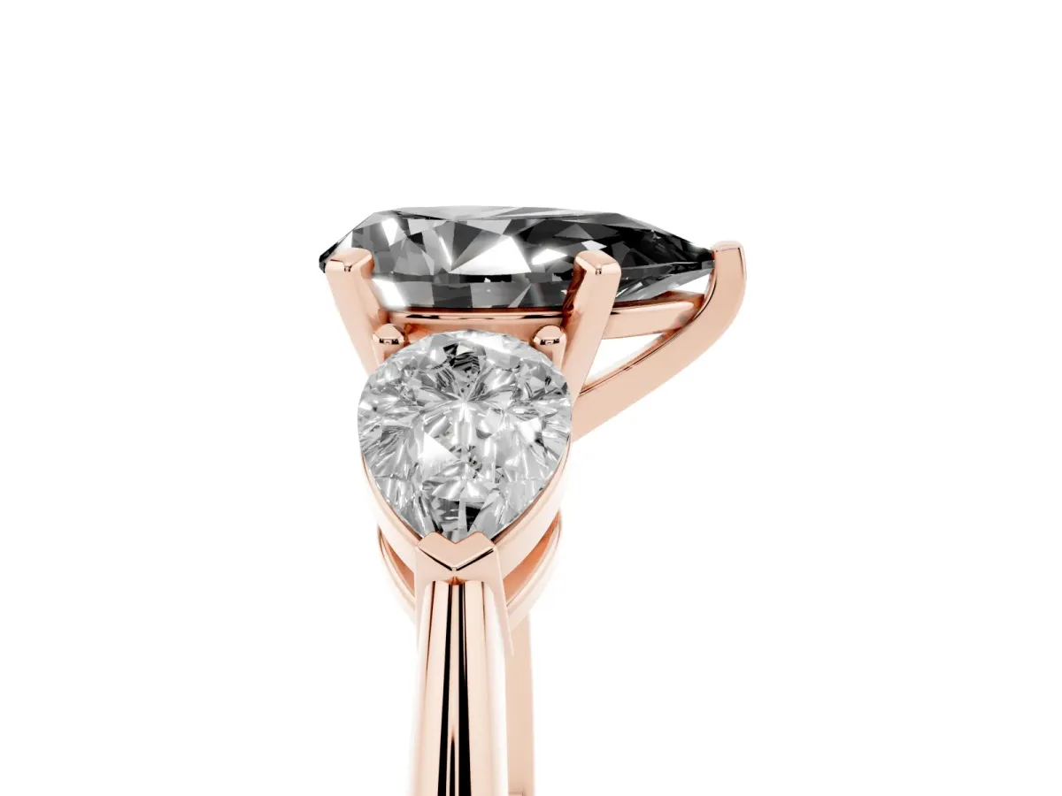 Fancy Black Three-Stone Pear Cut Diamond Ring with Pear Side Stones and Four-Prong Setting Rose gold